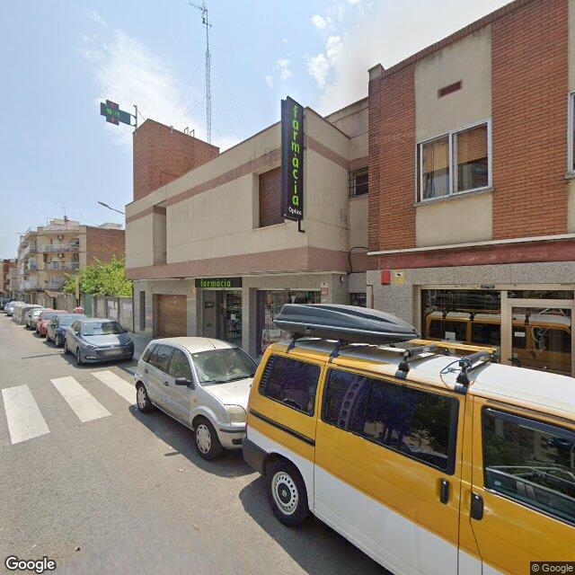 Street view near Farmàcia Artiga in Barcelona