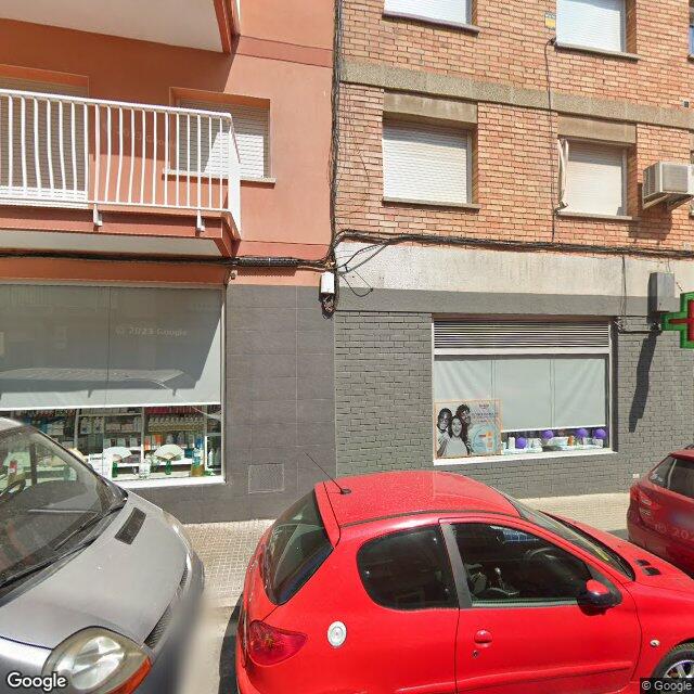 Street view near Farmàcia Beltran Artola, Maria Gràcia in Barcelona