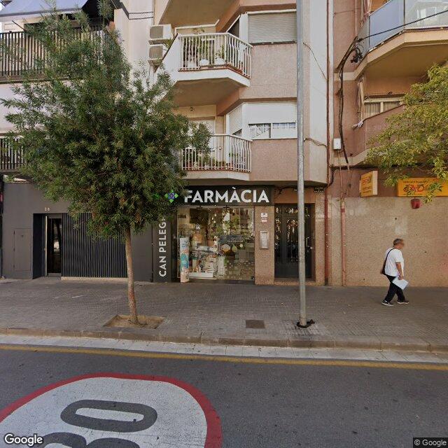 Street view near Farmàcia Can Pelegrí in Barcelona