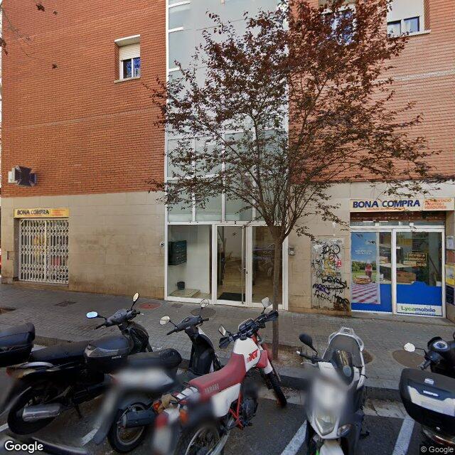 Street view near Farmàcia Del Sortidor in Spain