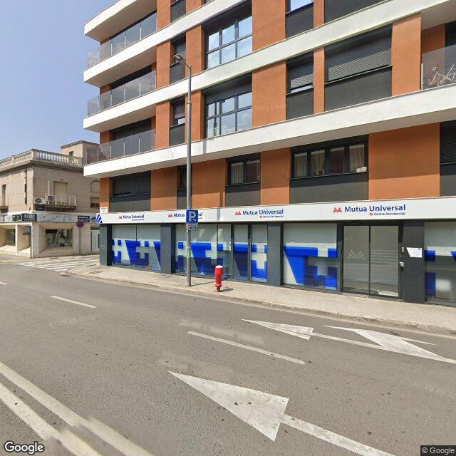 Street view near Farmàcia Escudé Grau, M. Rosa I Mercè in Barcelona