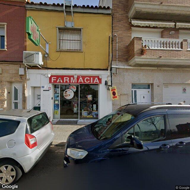 Street view near Farmàcia Ferrer San José, Carles in Barcelona