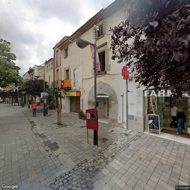 Street view near Farmàcia Josefina Comaposada I Beringues in Barcelona