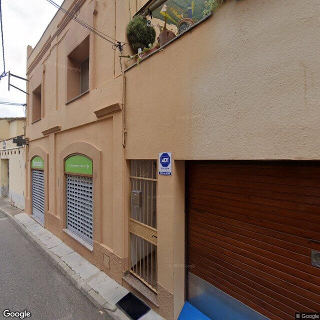 Street view near Farmàcia Lda. L. Bartrina in Gerona