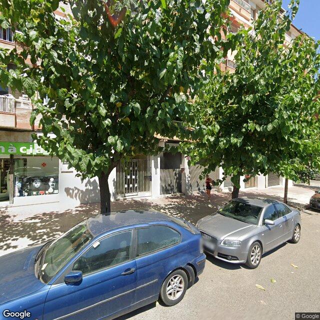 Street view near Farmàcia Lluch Villamor, Maria Roser in Barcelona