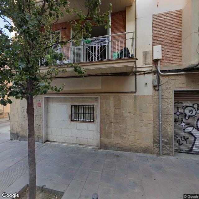 Street view near Farmàcia Ormad Cortés in Barcelona