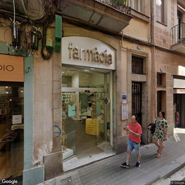 Street view near Farmàcia Travessera in Spain