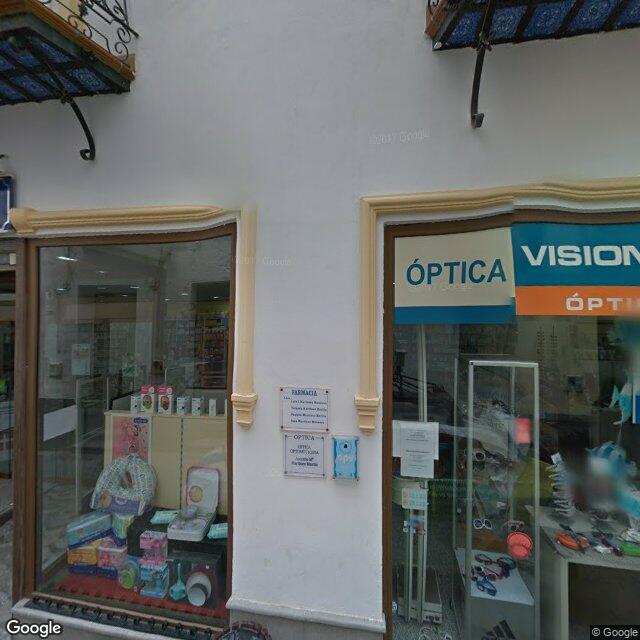 Street view near Farmacia Albuñol in Granada