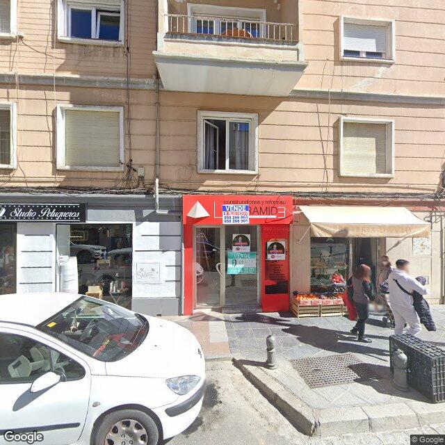Street view near Farmacia Alonso in Granada