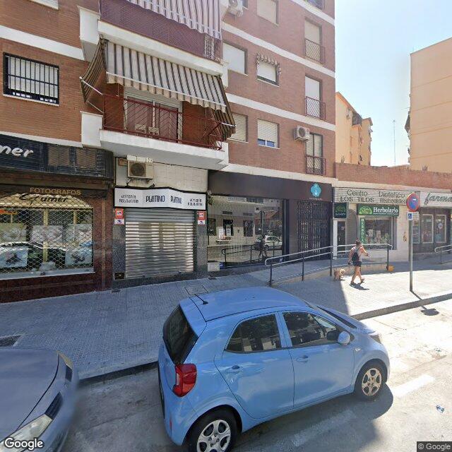 Street view near Farmacia Alonso in Málaga