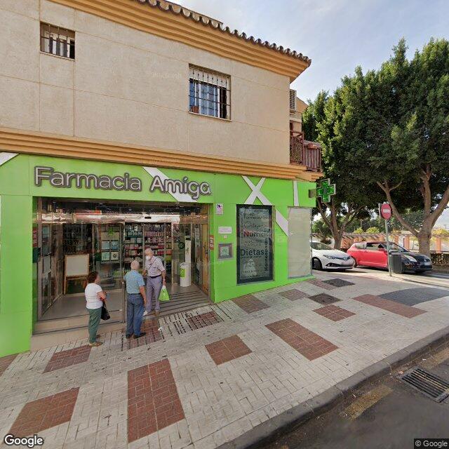 Street view near Farmacia Amiga in Málaga