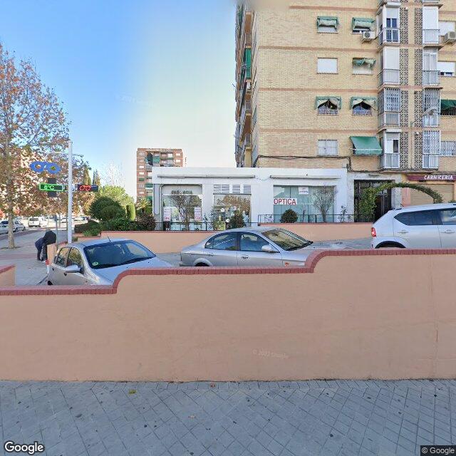 Street view near Farmacia Antonio Figueredo Cabrera in Granada