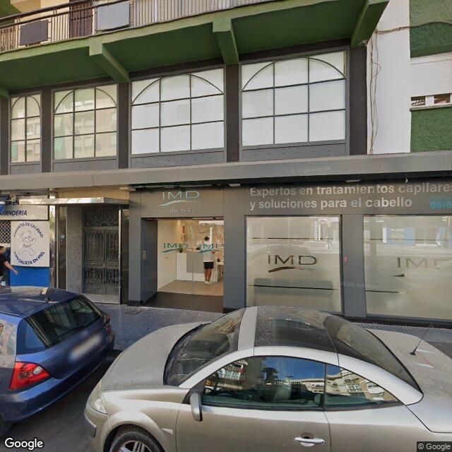 Street view near Farmacia Armengual in Málaga