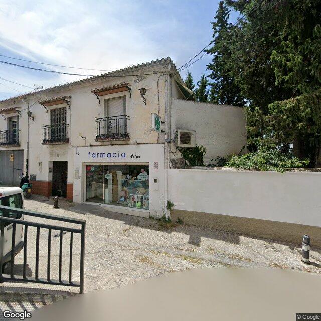 Street view near Farmacia Calzas in Granada