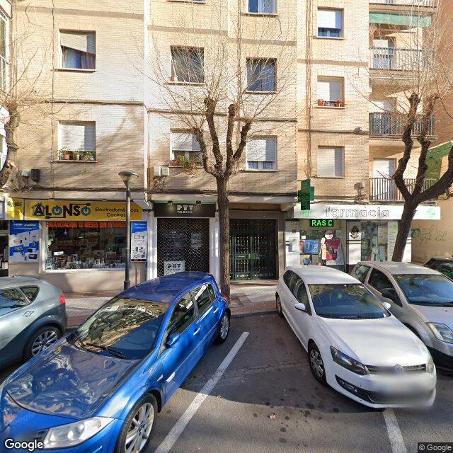 Street view near Farmacia Carrillo in Granada