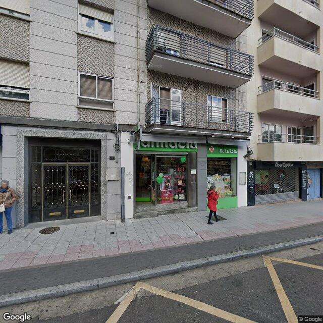 Street view near Farmacia De La Rosa in Spain
