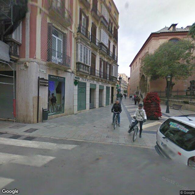 Street view near Farmacia Del Sagrario in Málaga