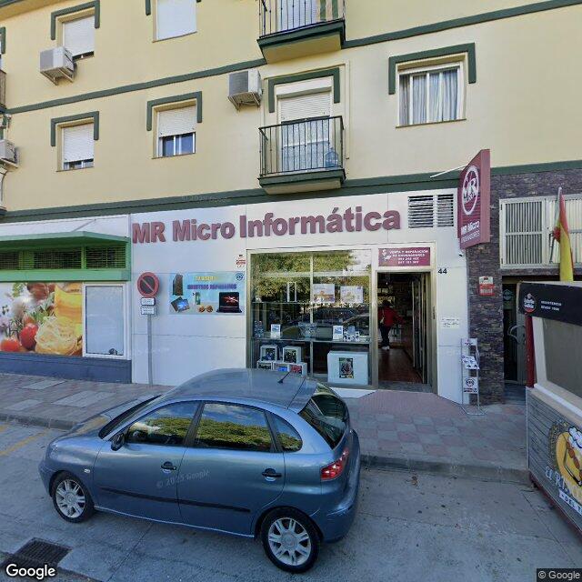 Street view near Farmacia Doctor Quesada C.B. in Spain