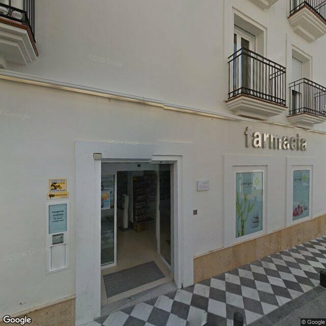 Street view near Farmacia Domínguez in San Roque