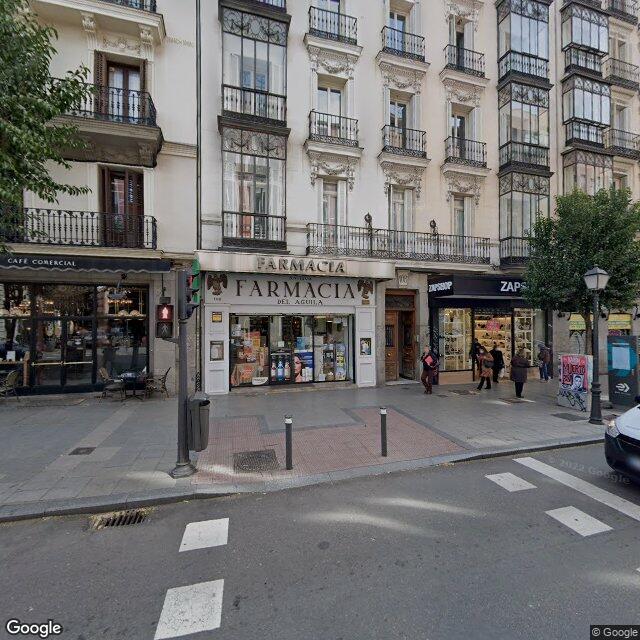 Street view near Farmacia El Águila in Madrid