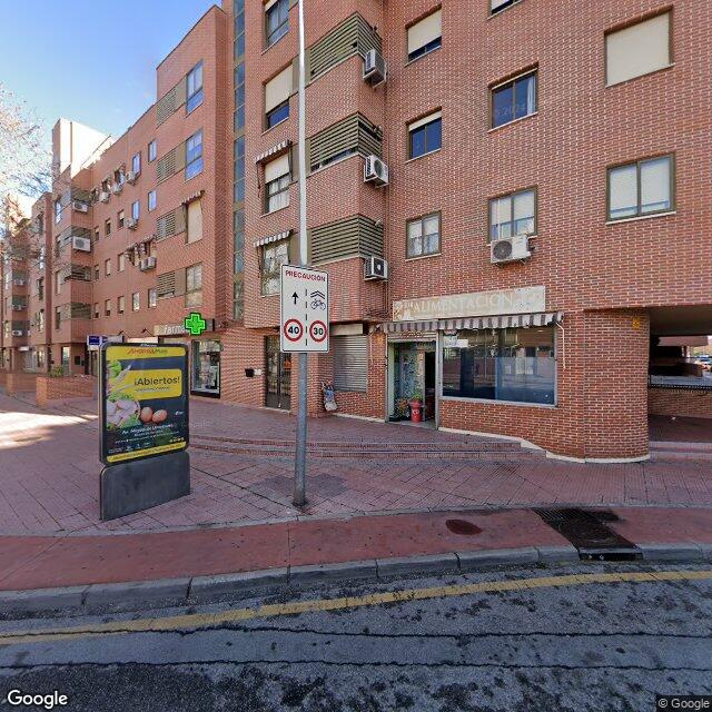 Street view near Farmacia El Ensanche in Spain
