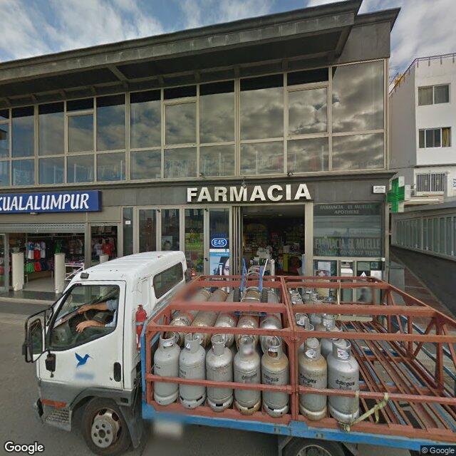 Street view near Farmacia El Muelle in Spain