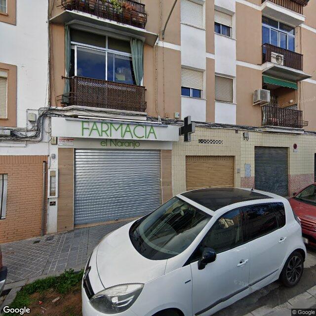 Street view near Farmacia El Naranjo in Spain
