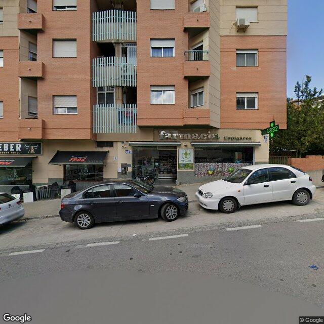 Street view near Farmacia Espigares in Granada