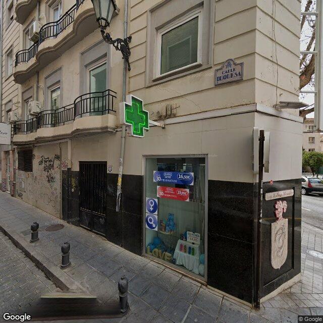 Street view near Farmacia Gran Capitán in Granada