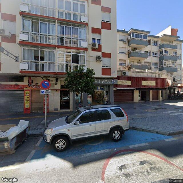 Street view near Farmacia Haya in Málaga