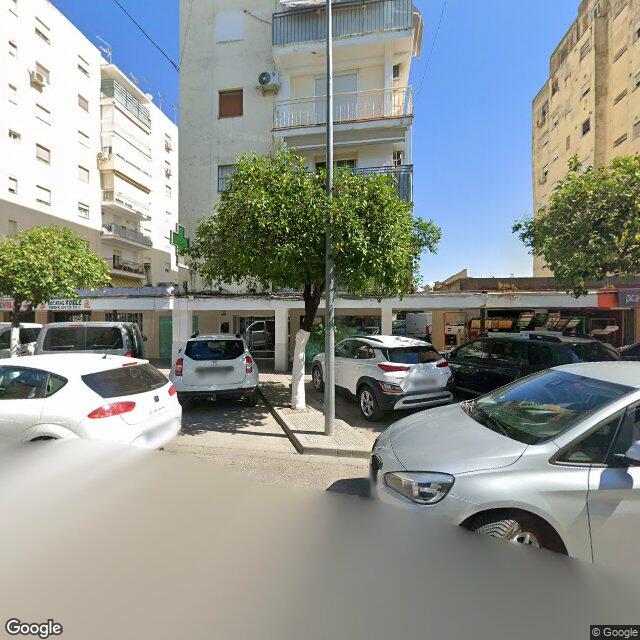 Street view near Farmacia Ibañez Barneto in Lora del Río