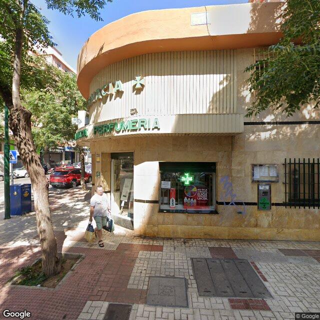 Street view near Farmacia Inés Delgado in Málaga