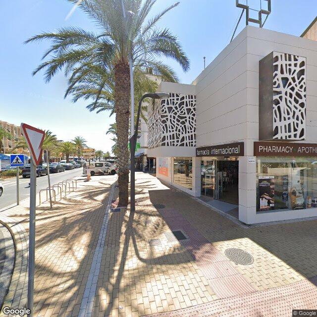 Street view near Farmacia International in Spain