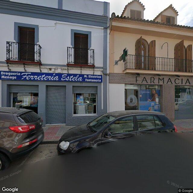 Street view near Farmacia Joaquín Sayago Massoni in Tocina