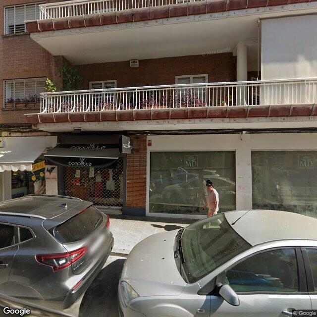 Street view near Farmacia Juan F. Fernandez Melo in Sevilla (los Remedios)