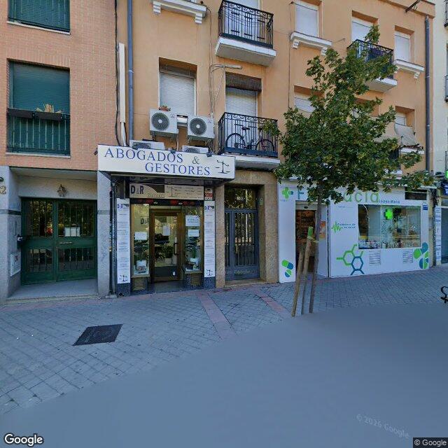 Street view near Farmacia López-Mora in Madrid