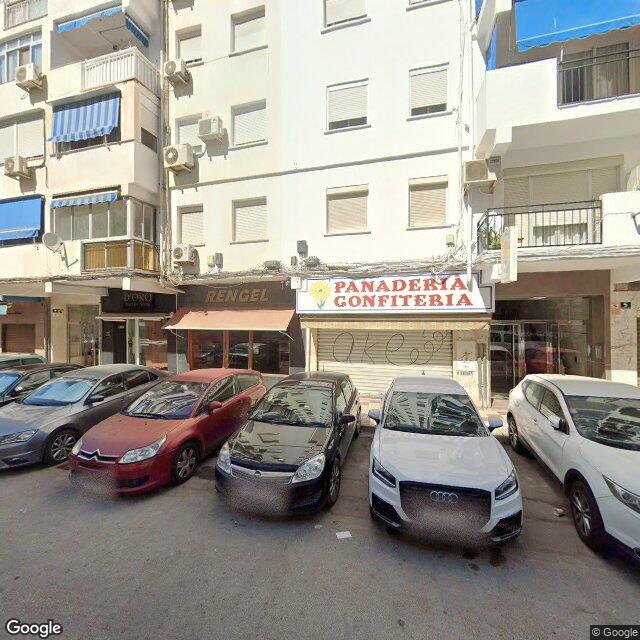 Street view near Farmacia López Santos in Málaga