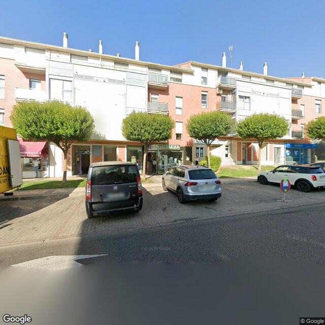 Street view near Farmacia La Flecha in Spain