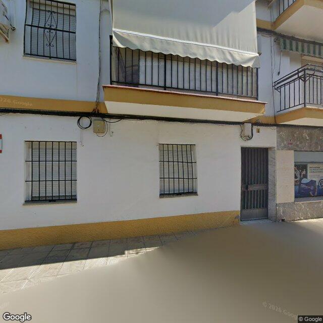 Street view near Farmacia La Huertecilla in Lora del Río