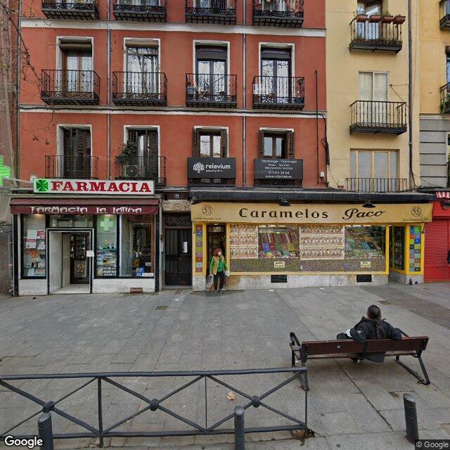 Street view near Farmacia La Latina in Madrid