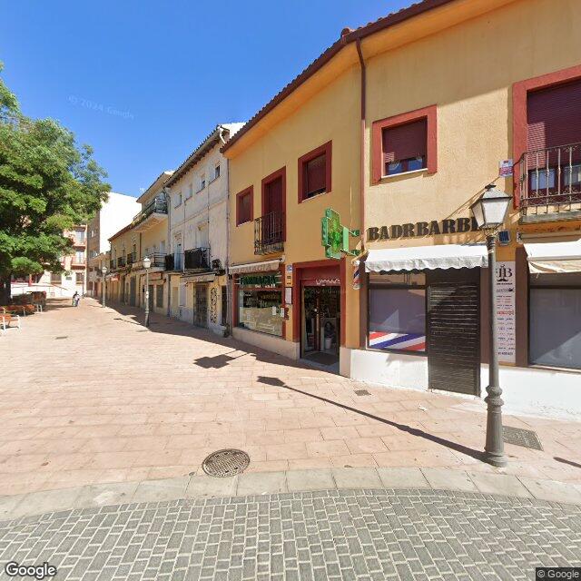Street view near Farmacia La Plaza in Madrid