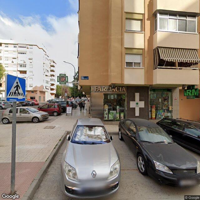 Street view near Farmacia La Roca in Málaga