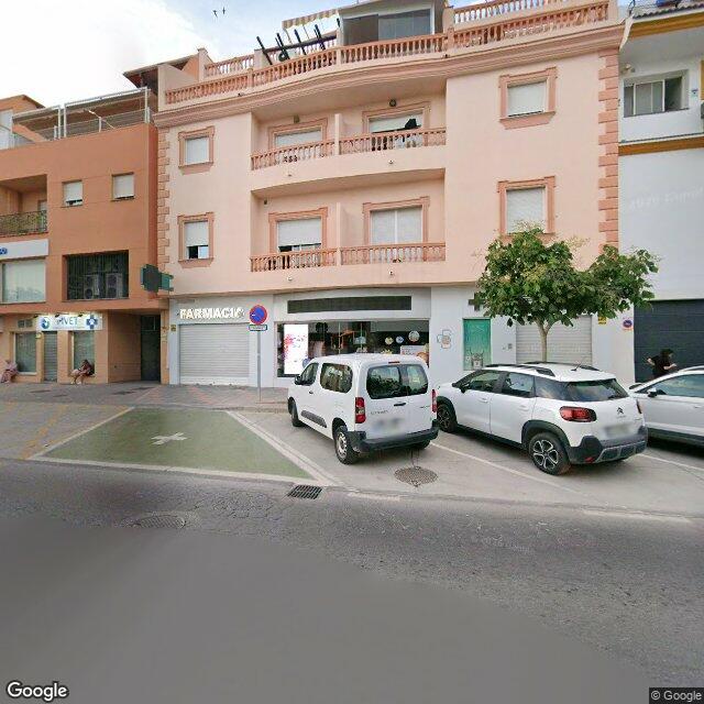 Street view near Farmacia Libertad in Las Lagunas