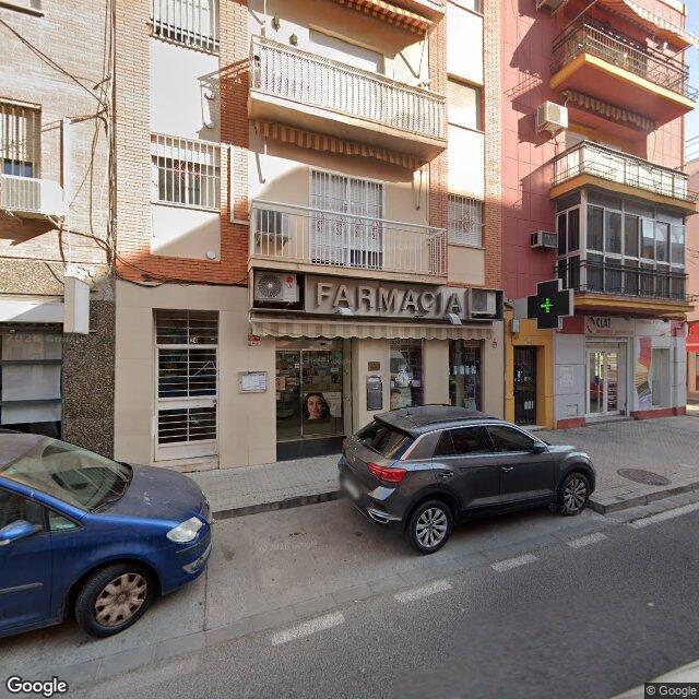 Street view near Farmacia Lola Moya Castro in Sevilla (triana)