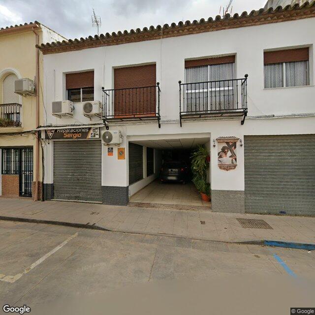 Street view near Farmacia Márquez Hidalgo in La Carlota