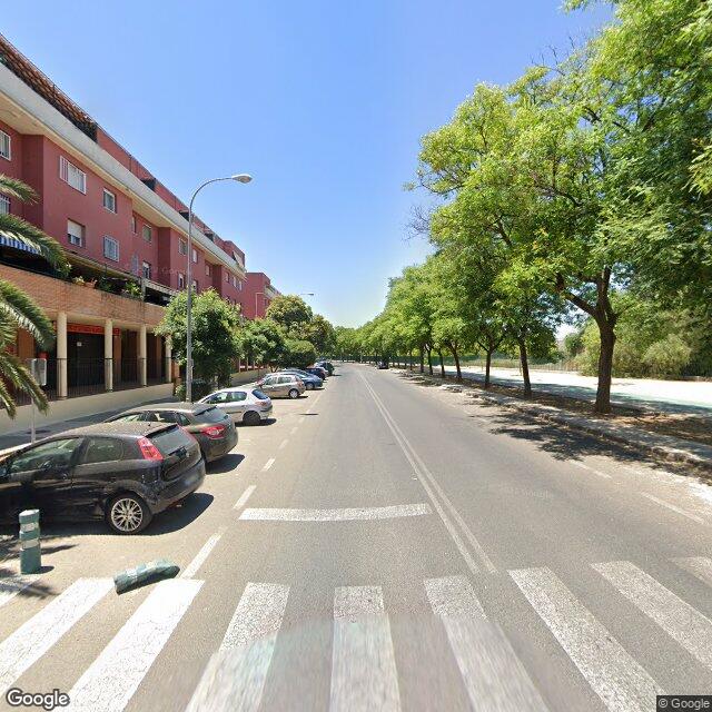 Street view near Farmacia Maria Cristina Valverde Martos in Sevilla (este-Alcosa-Torreblanca)