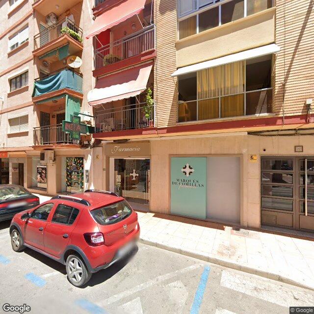 Street view near Farmacia Marqués De Comillas in Spain