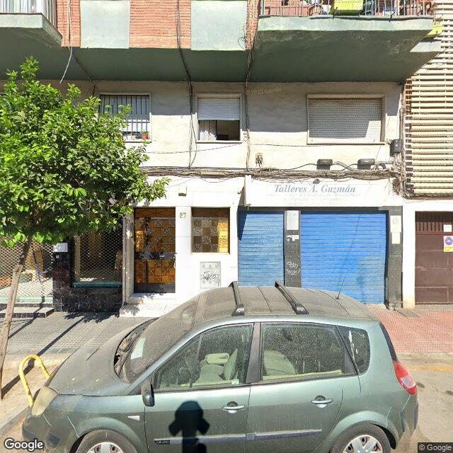 Street view near Farmacia Materno in Málaga
