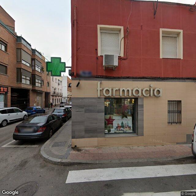 Street view near Farmacia Molina De La Hoz in Madrid