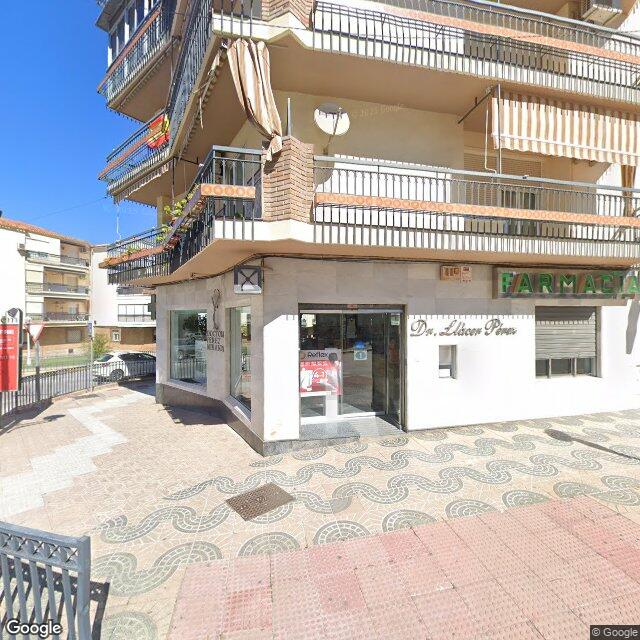 Street view near Farmacia Moris in Spain